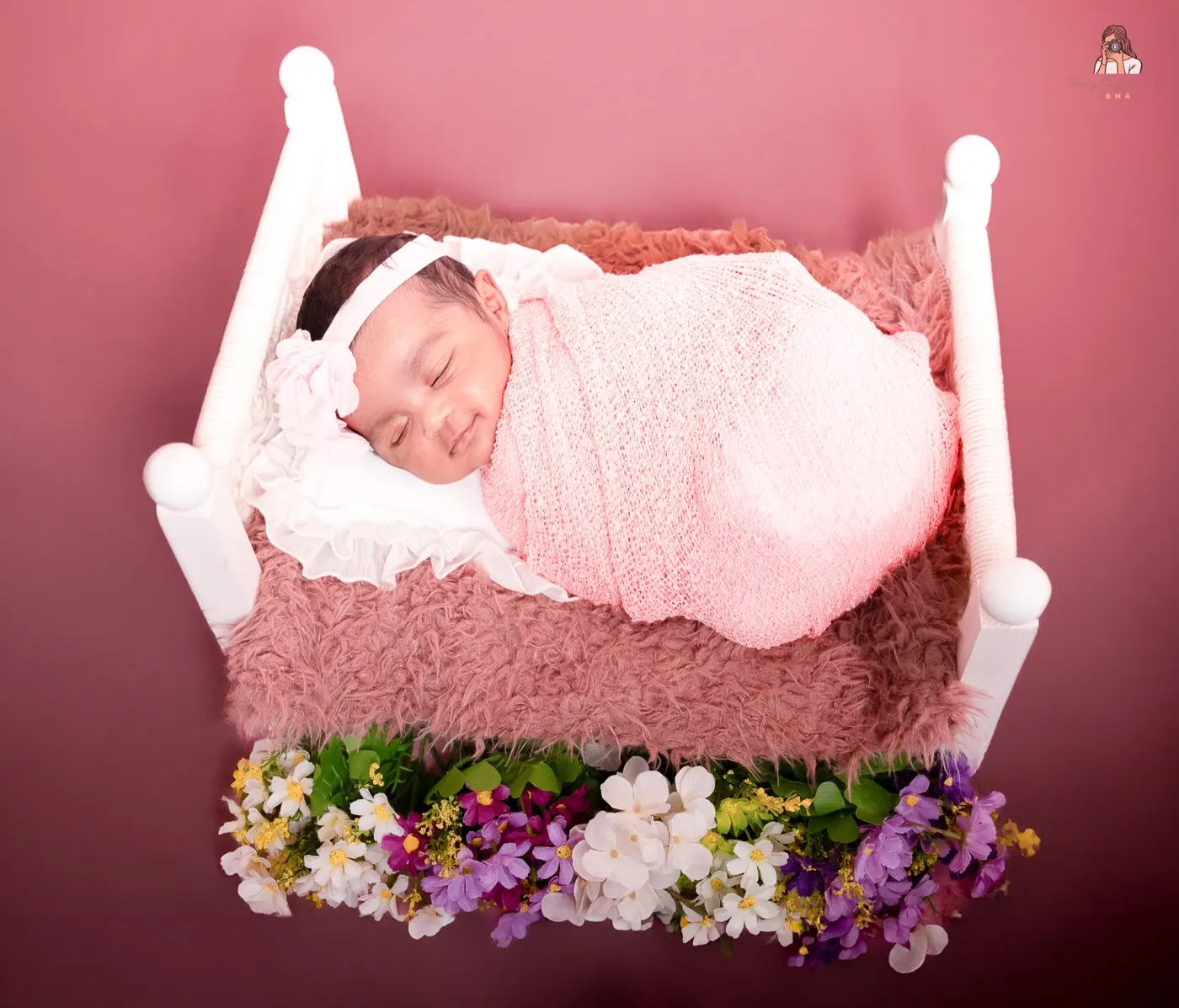 A newborn photographed in the studio in Berlin.