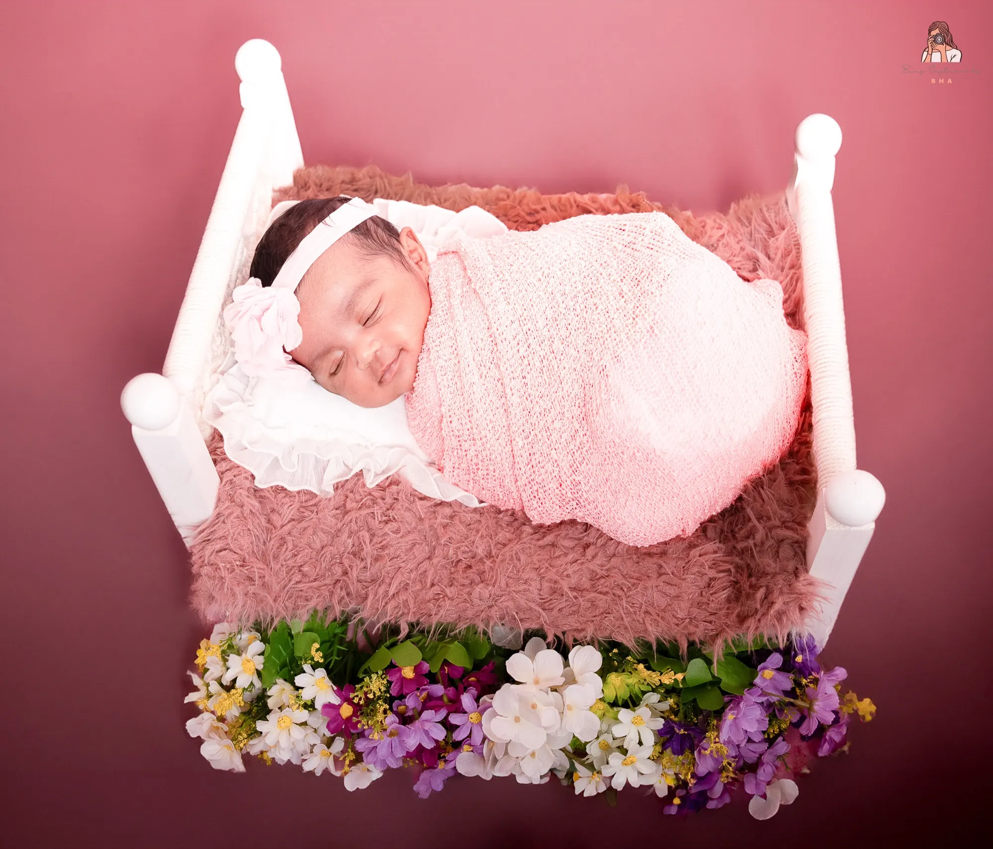 A newborn photographed in our Berlin studio.